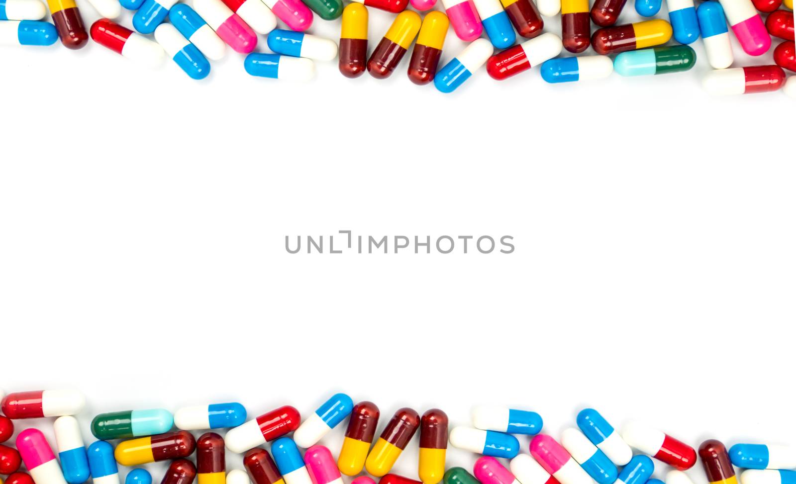 Colorful of antibiotic capsules pills isolated on white background with copy space. Drug resistance concept. Antibiotics drug use with reasonable and global healthcare concept. Pharmaceutical industry. Pharmacy background.