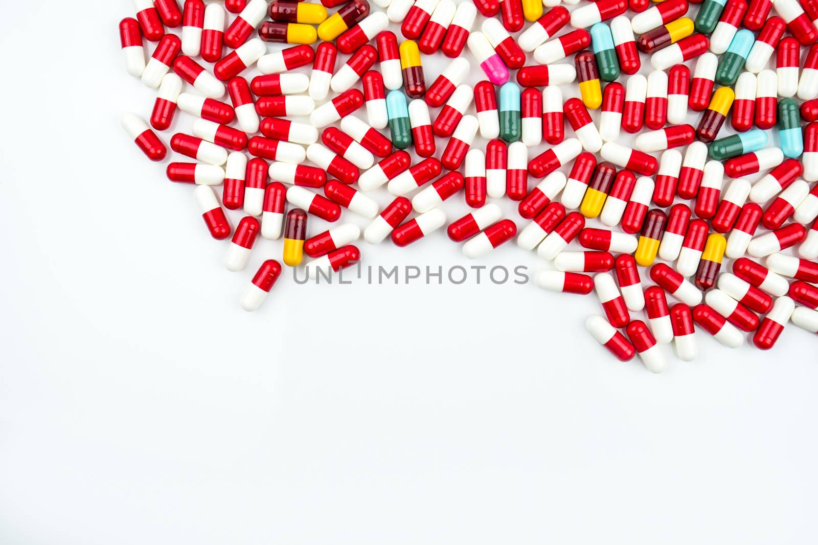 Colorful of antibiotic capsules pills isolated on white background with copy space. Drug resistance concept. Antibiotics drug use with reasonable and global healthcare concept. Pharmaceutical industry. Pharmacy background.