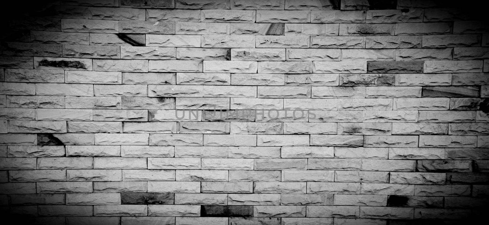 Black and white brick wall for background with copy space for text