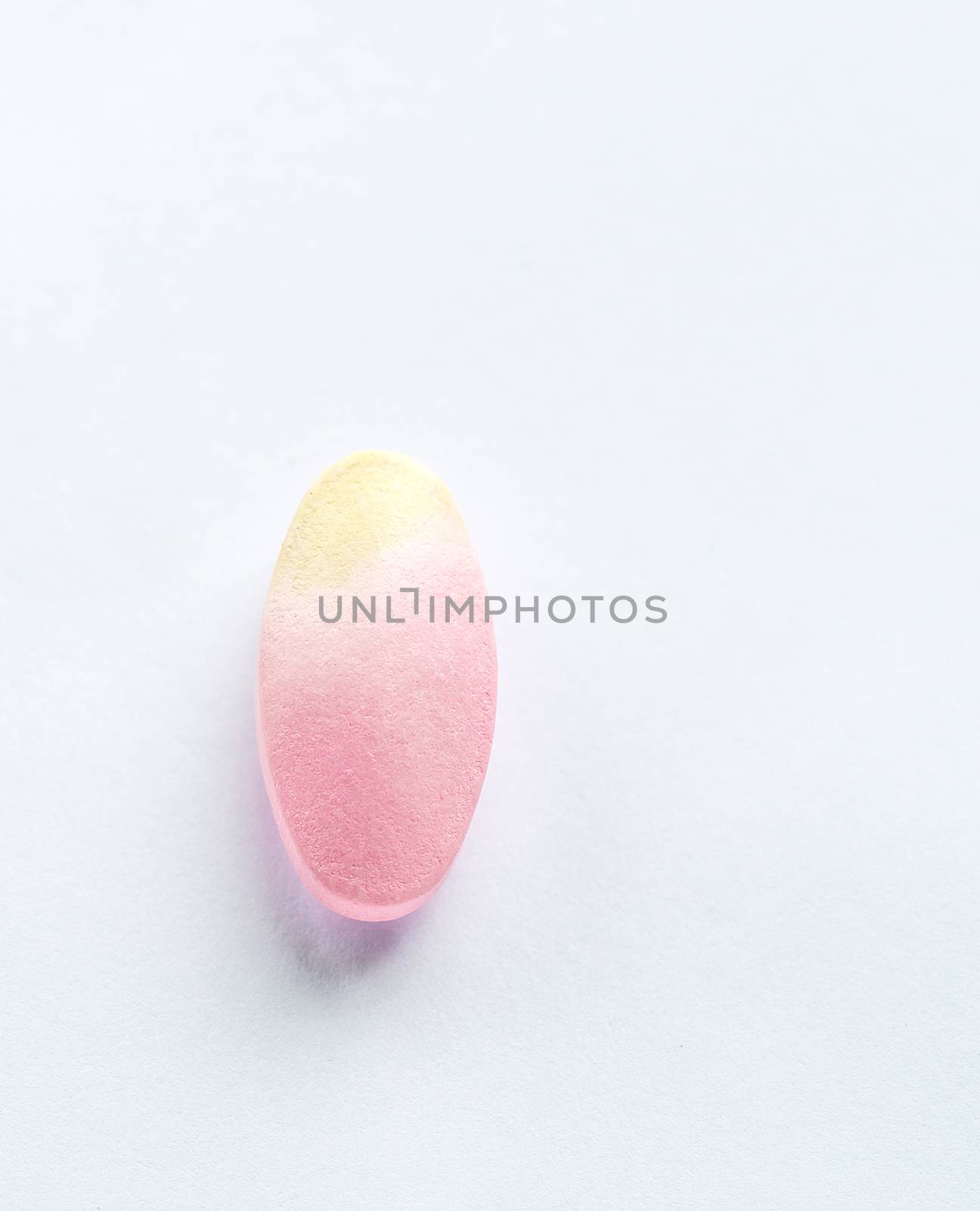 Expired calcium tablet pills with color change isolated on white background with copy space