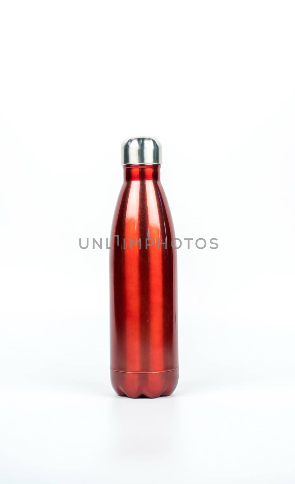 Red thermos bottle with sport design isolated on white background with copy space. Beverage container. Coffee and tea bottle.