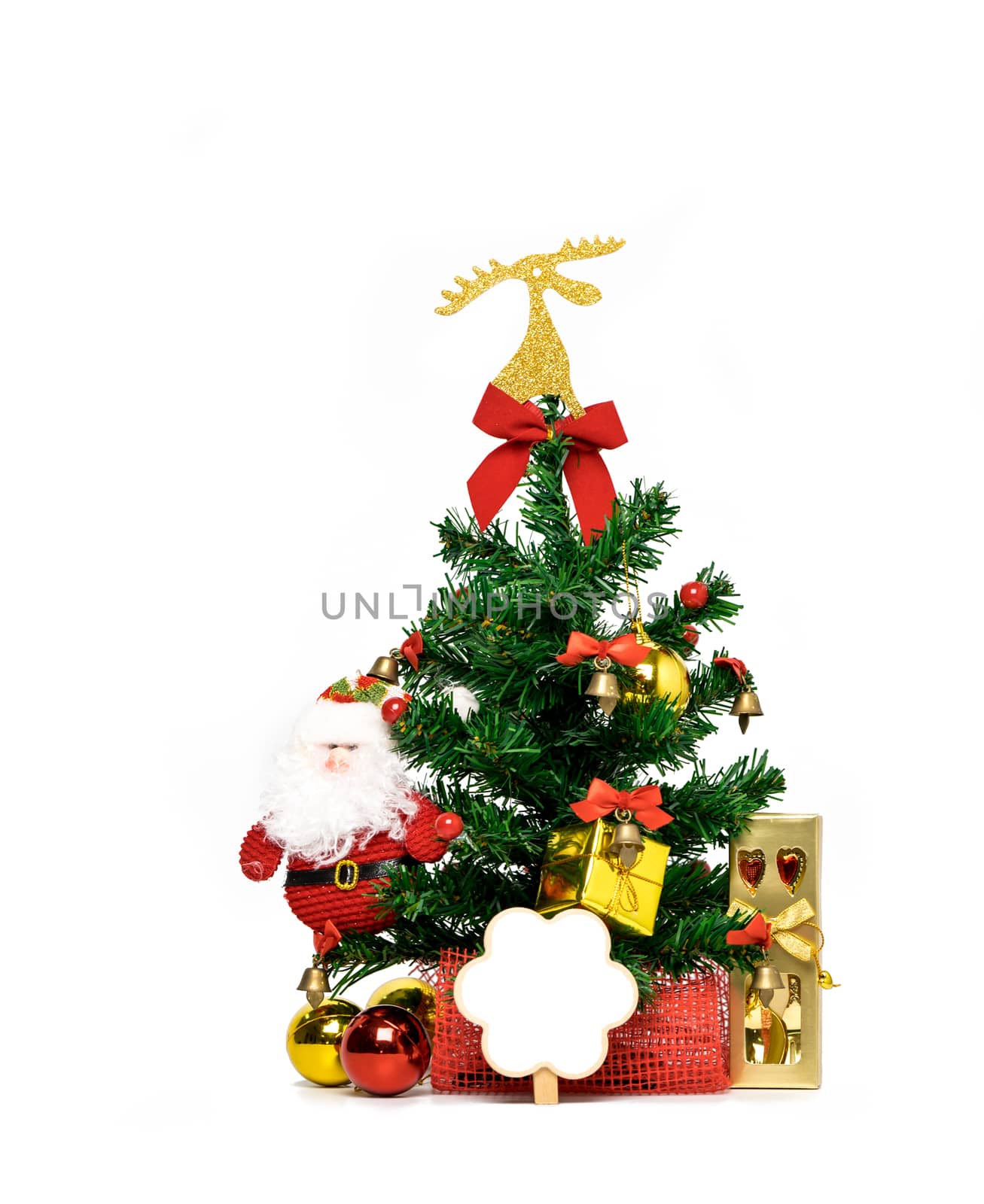 Christmas tree decorated with ribbon, card, fork and spoon in golden gift box, Santa Claus and ball on white background with copy space, just add your own text