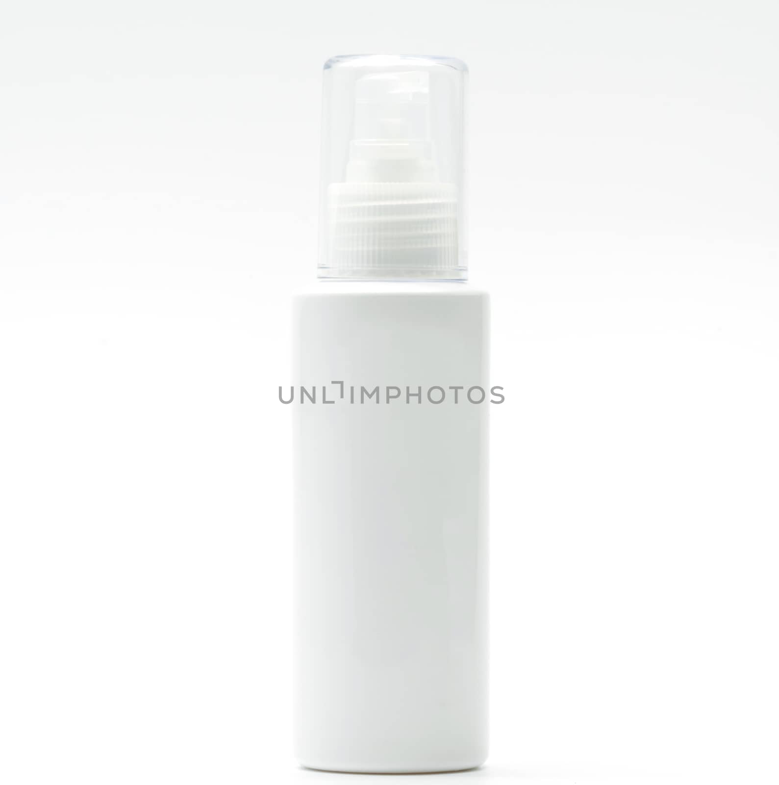 Cosmetic bottle with pump isolated on white background, blank label, just add your own text