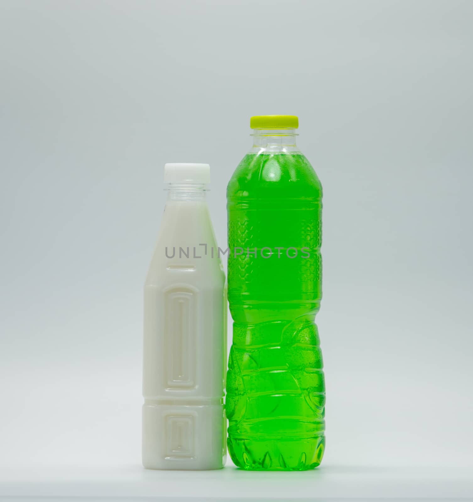 Soft drinks in plastic bottle with modern packaging on white background by Fahroni