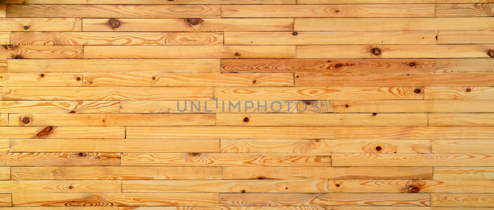 Closeup yellow wood with unique pattern texture background.