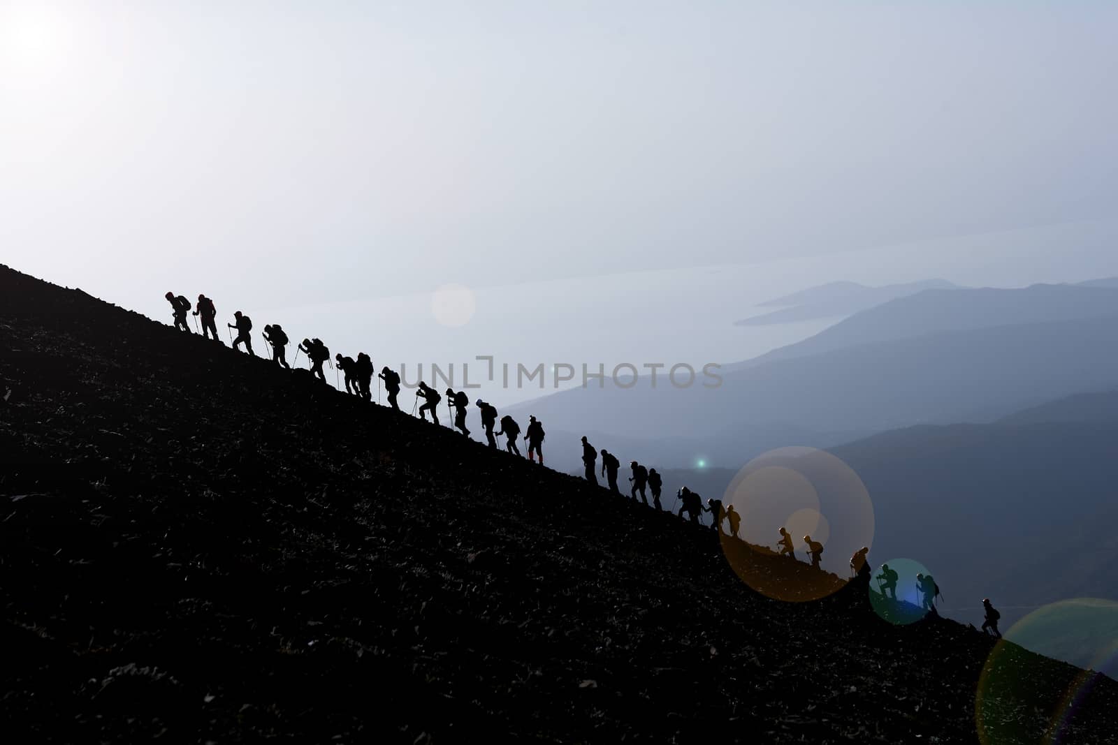 Mountain climbers at the peak of the mountains