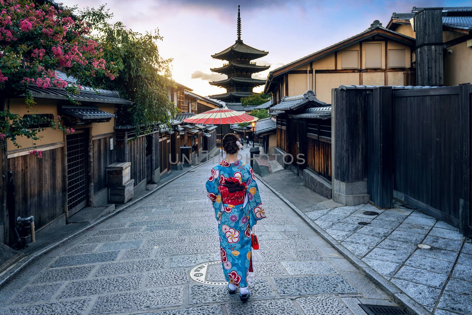 Asian woman wearing japanese traditional kimono at Yasaka Pagoda and Sannen Zaka Street in Kyoto, Japan. by gutarphotoghaphy