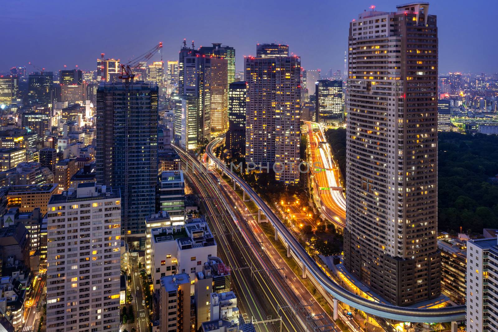 Tokyo cityscape and traffic at night. by gutarphotoghaphy