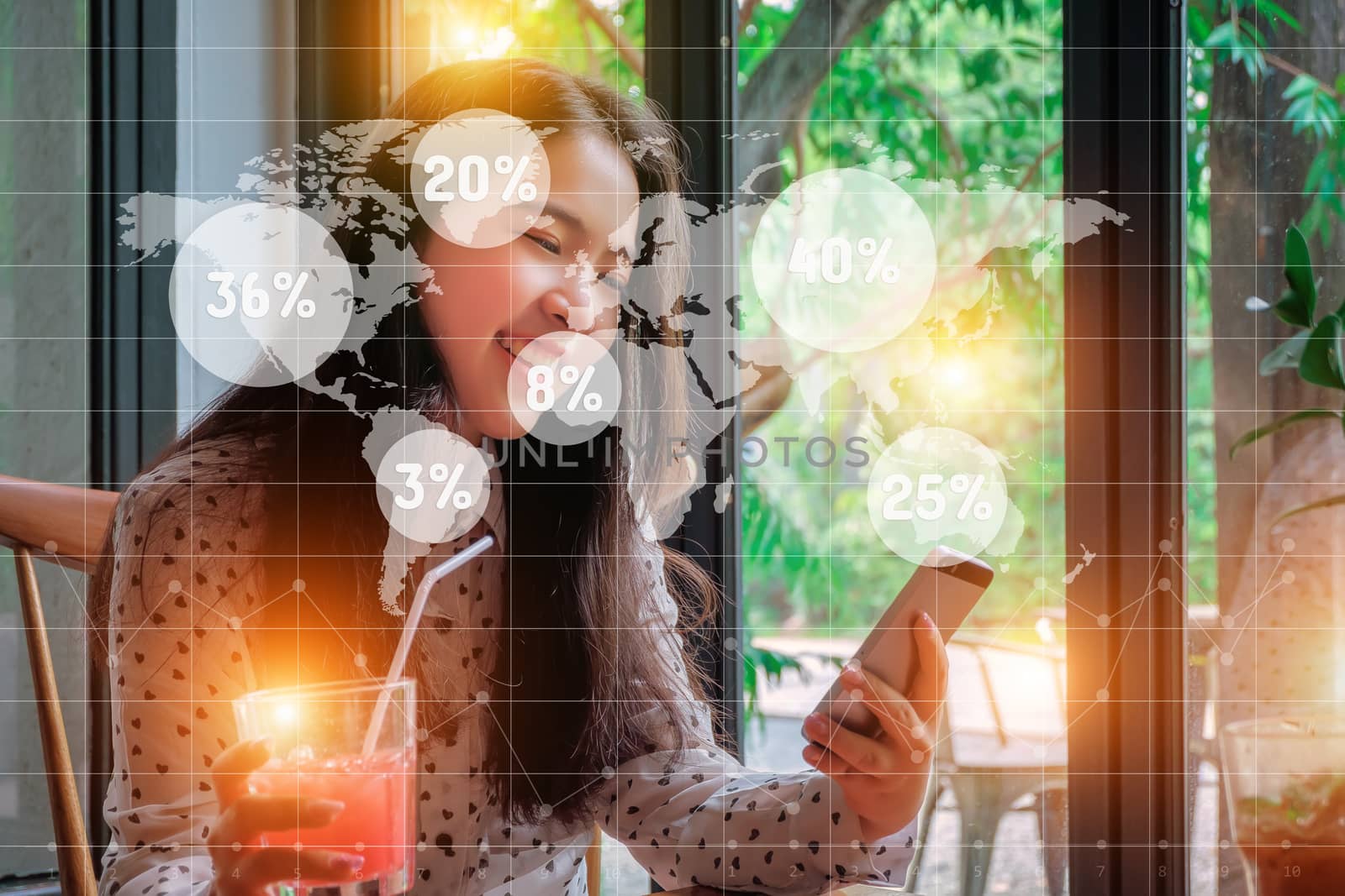 Young businesswoman is checking the sales of each region with her smart phone.