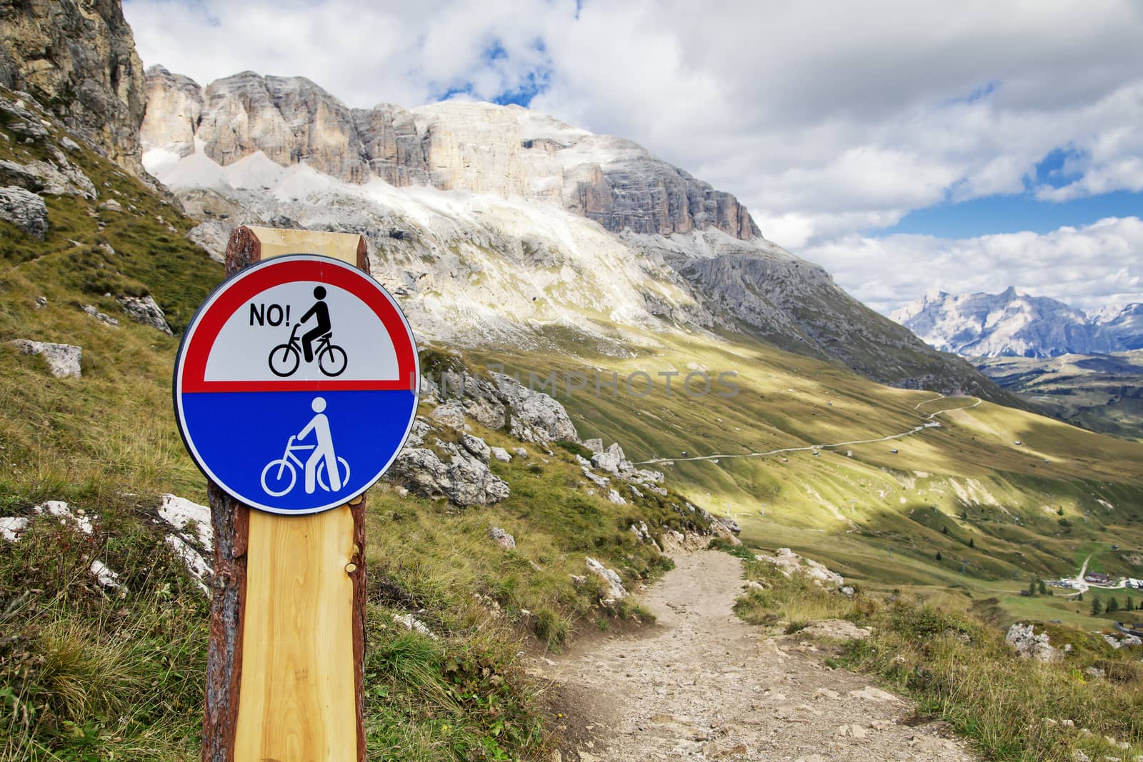 Road sign on a mountain road in Dolomites, Italy
