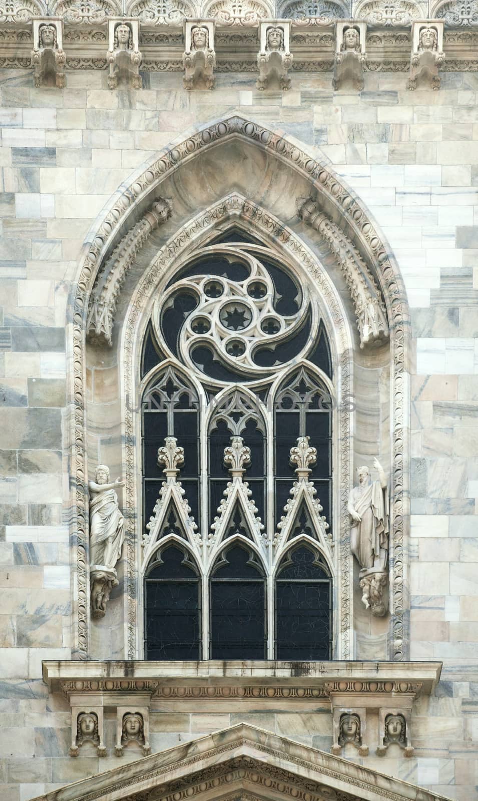 Ornamented window of a cathedral in gothic style