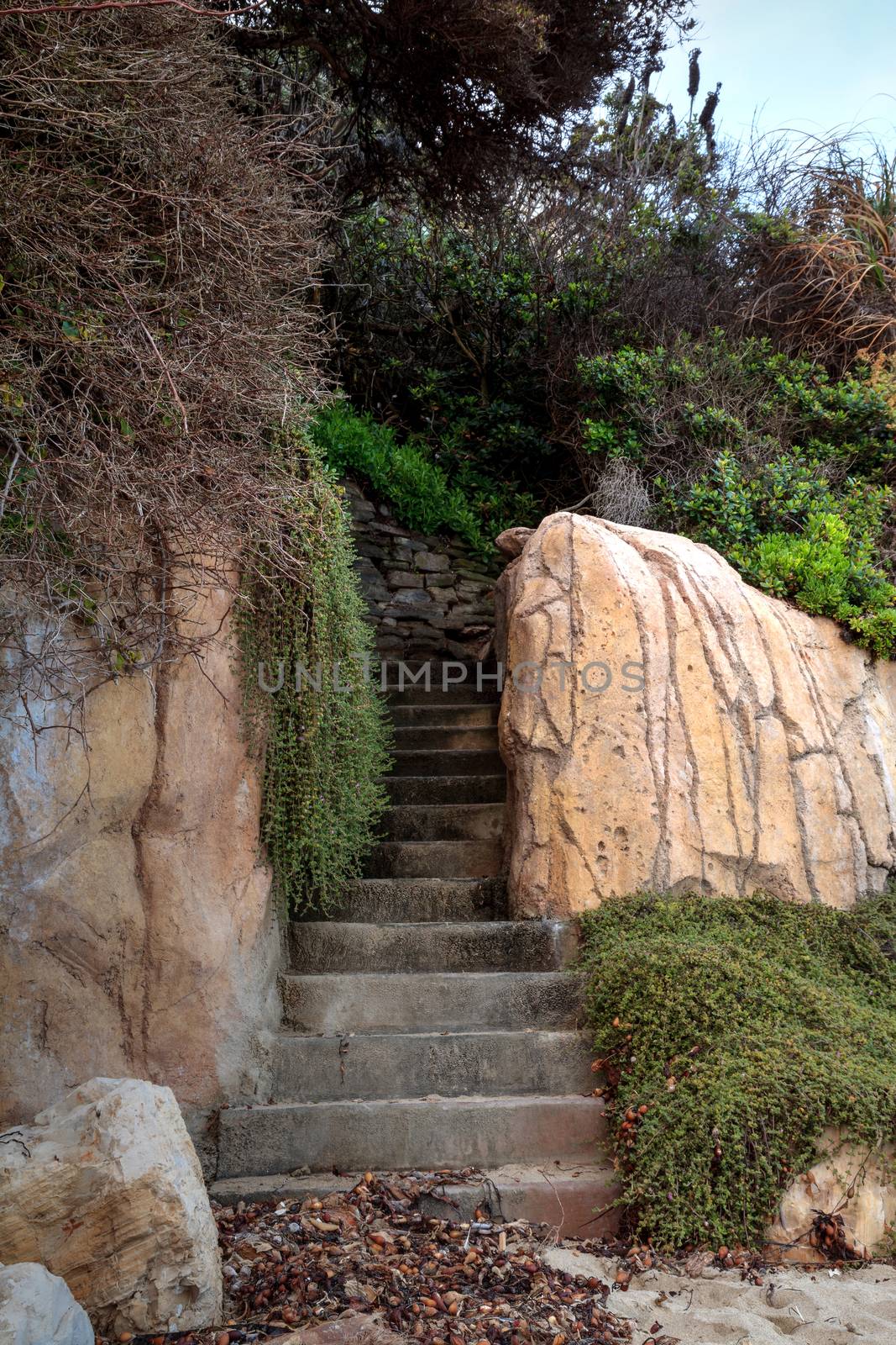 Stone steps leading into an alcove found on a California beach along the coastline