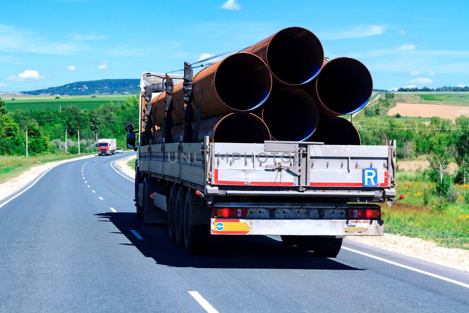 Picture of big truck with the trailer moves on the highway by Nobilior