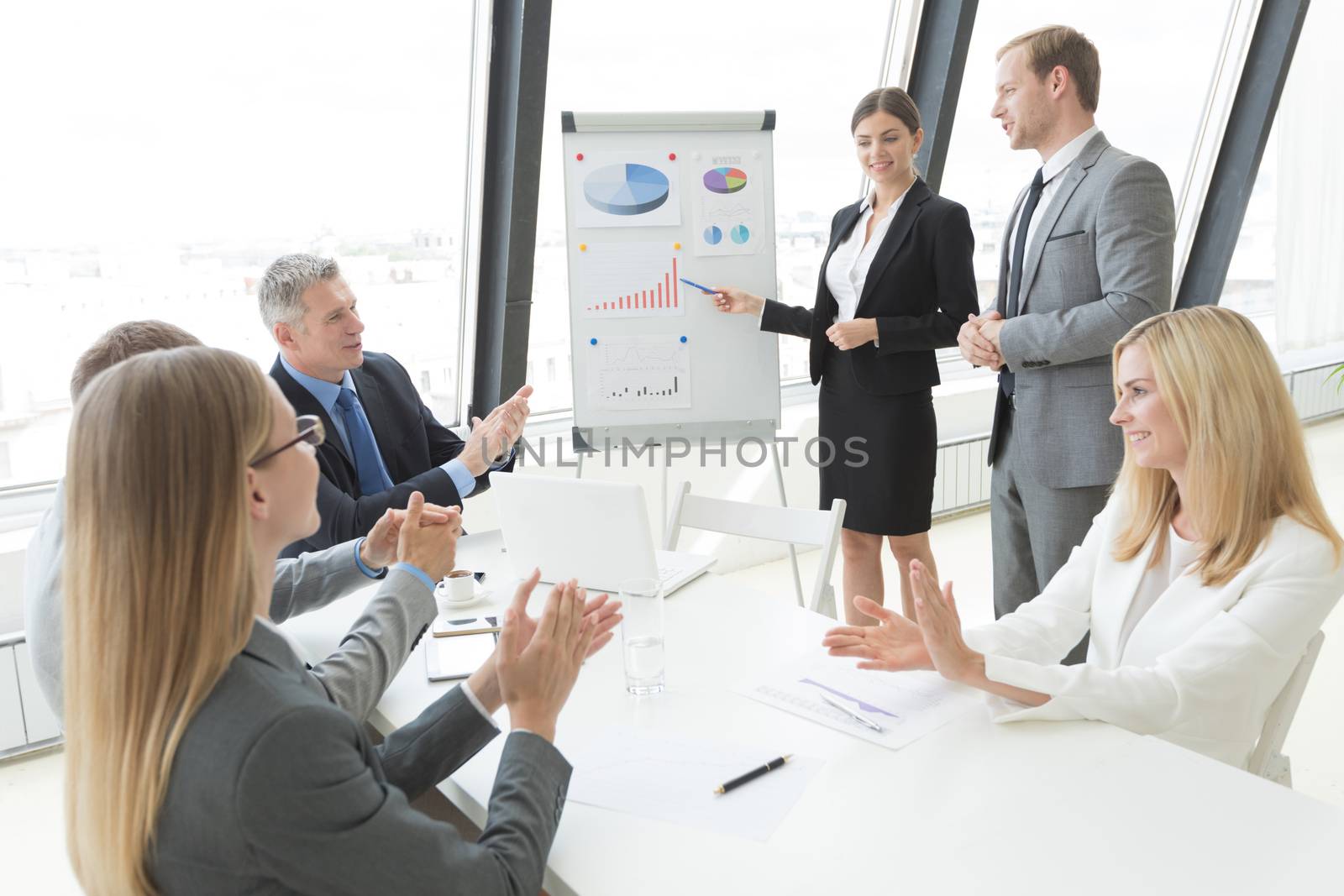 Business team at presentation in office by Yellowj