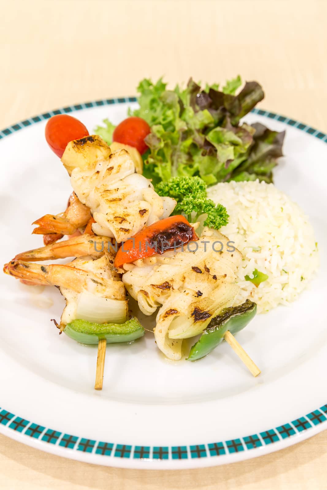grilled seafood skewer with fried rice