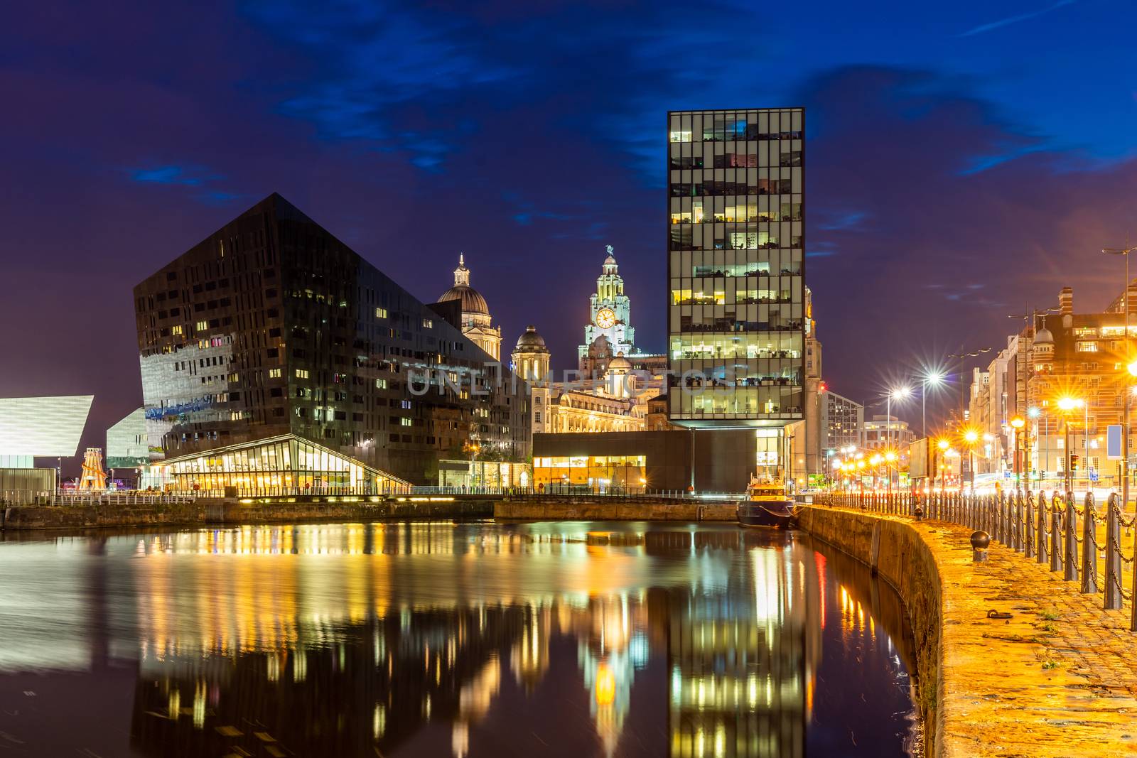 Liverpool Skyline building at Pier head and alber dock at sunset dusk, Liverpool England UK.