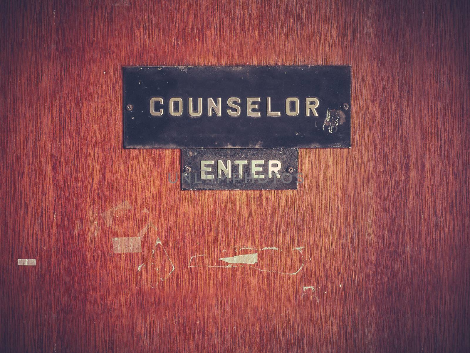 Retro Grungy Counselor's Office Door At A Public School Or University