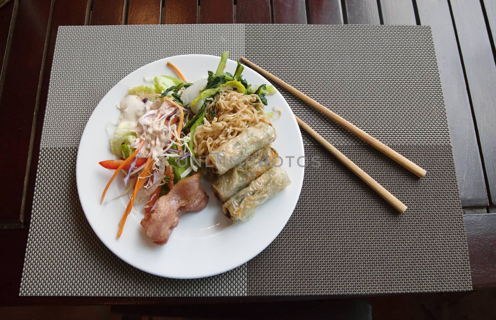 Vietnamese breakfast on a plate with chopsticks