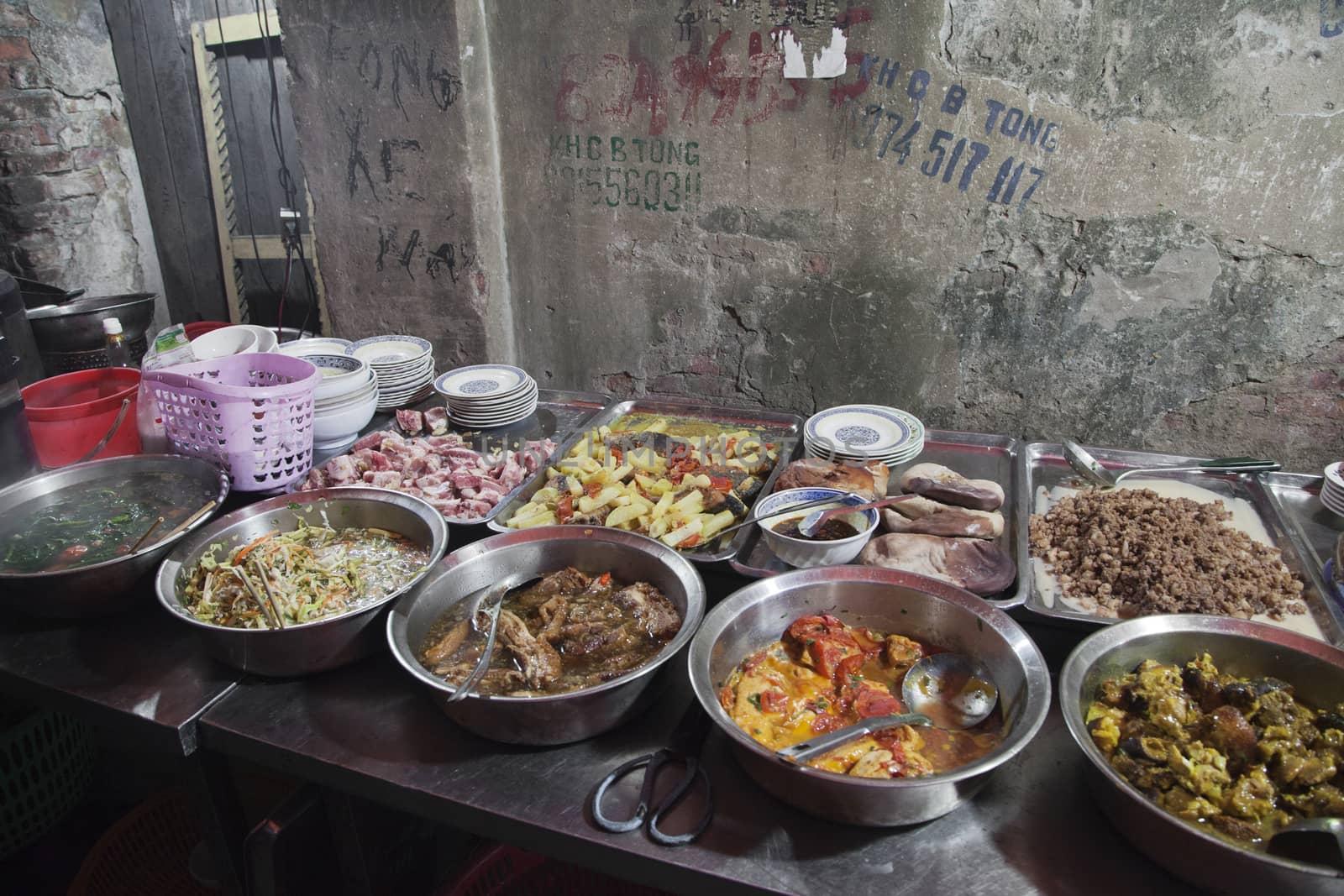 Various food in a Vietnamese street cafe