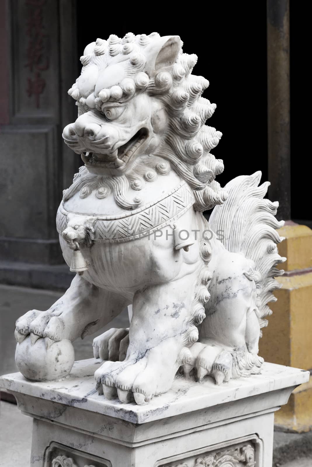 Marble lion at the entrance of a temple, Vietnam