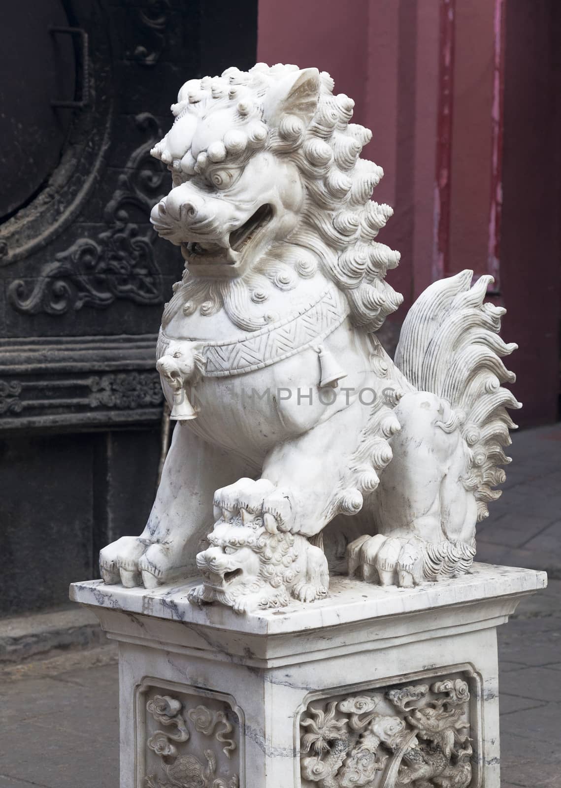 Marble lion at the entrance of a temple, Vietnam