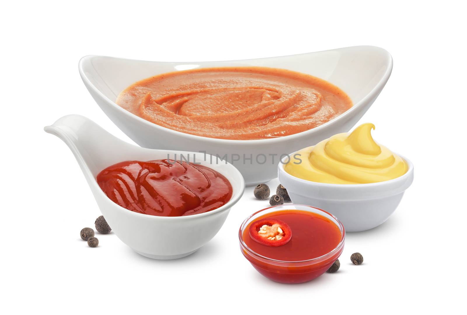 Ingredients of cocktail sauce isolated on white background. Mayonnaise, ketchup and hot pepper. Shrimp sauce