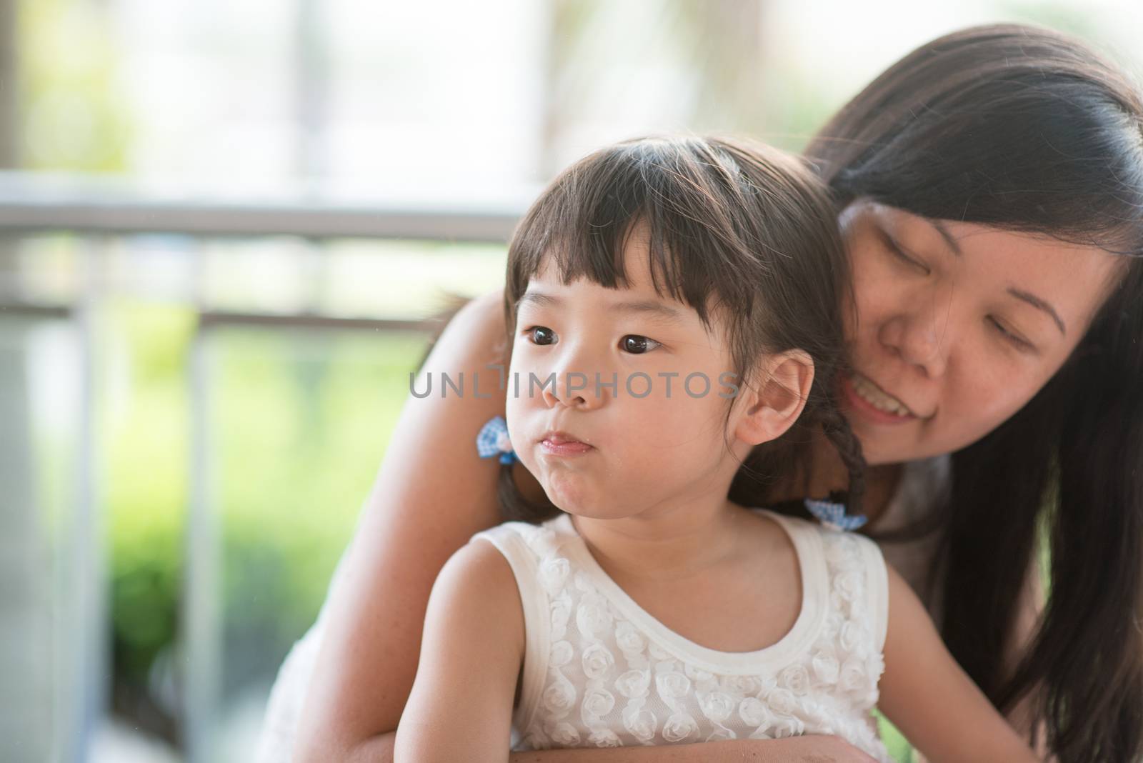 Asian family outdoor lifestyle with natural light.