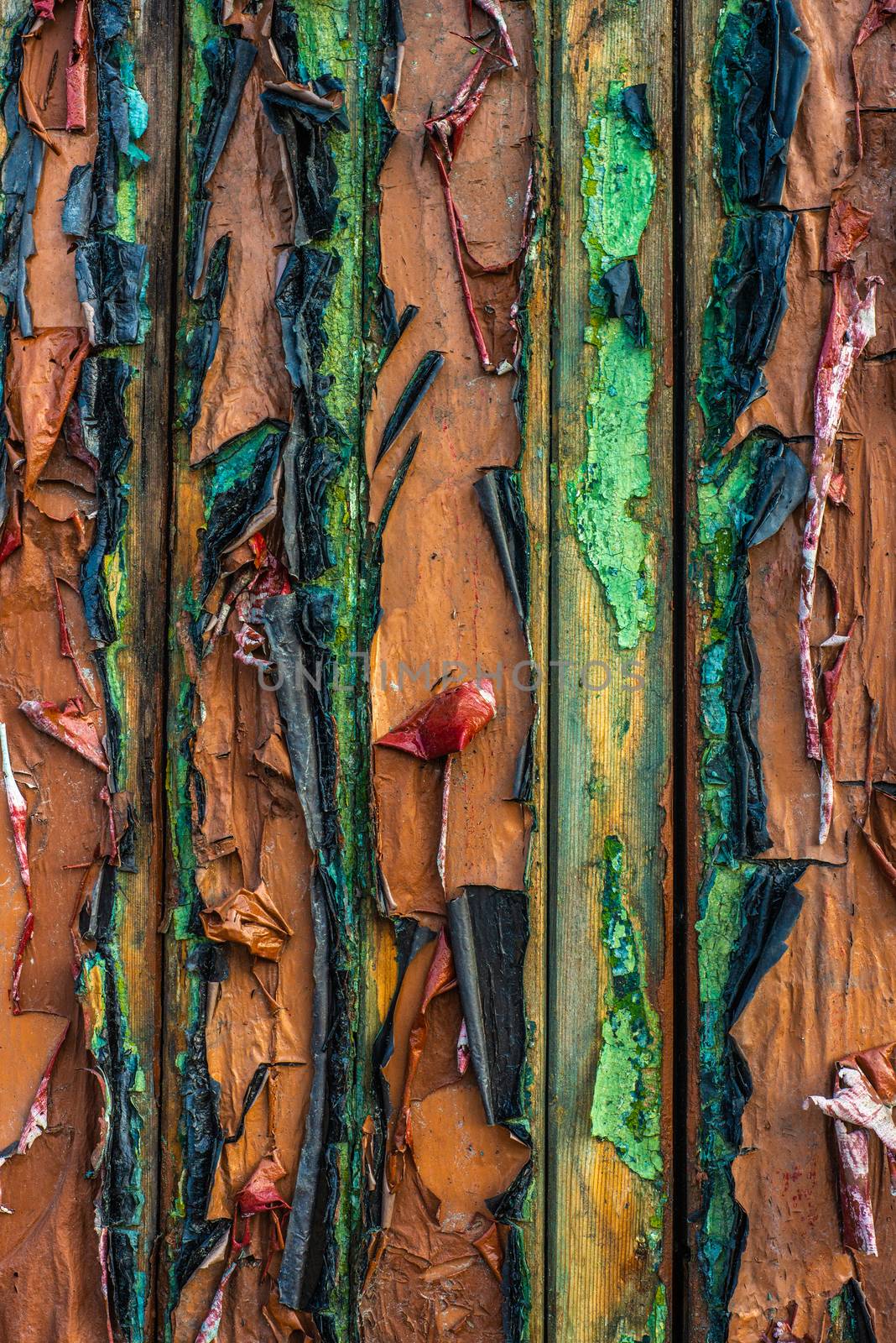 Abstract Background Of Peeling Paint On A Wooden Building