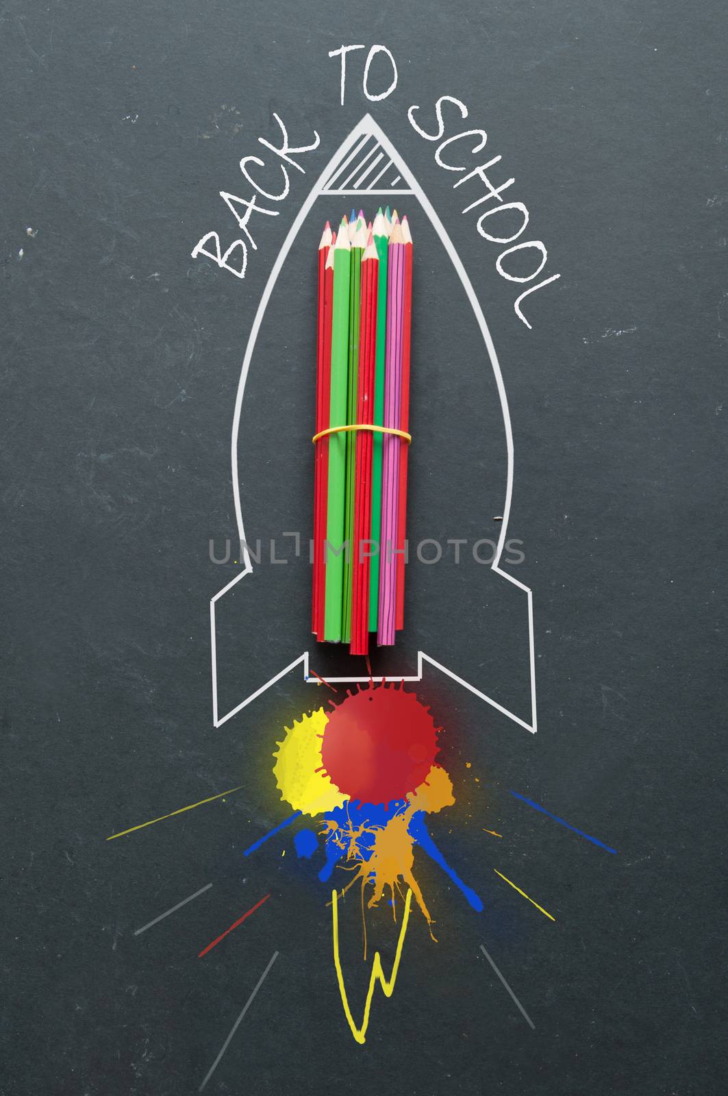 Rocket launch sketch with colourful pencils and paint burst 