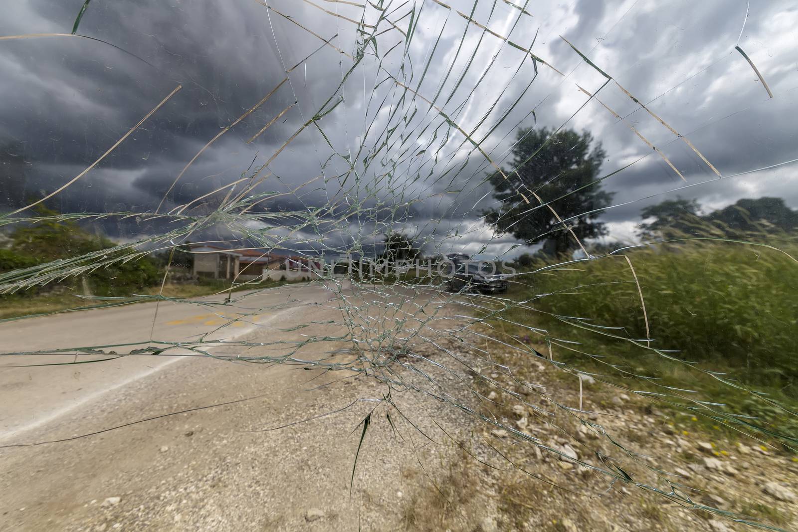 damaged glass at bus stop shelter