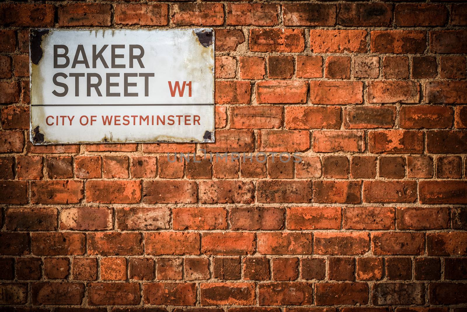 A Sign For Baker Street In Westminster, London, England, UK, On A Red Brick Wall With Copy Sapce