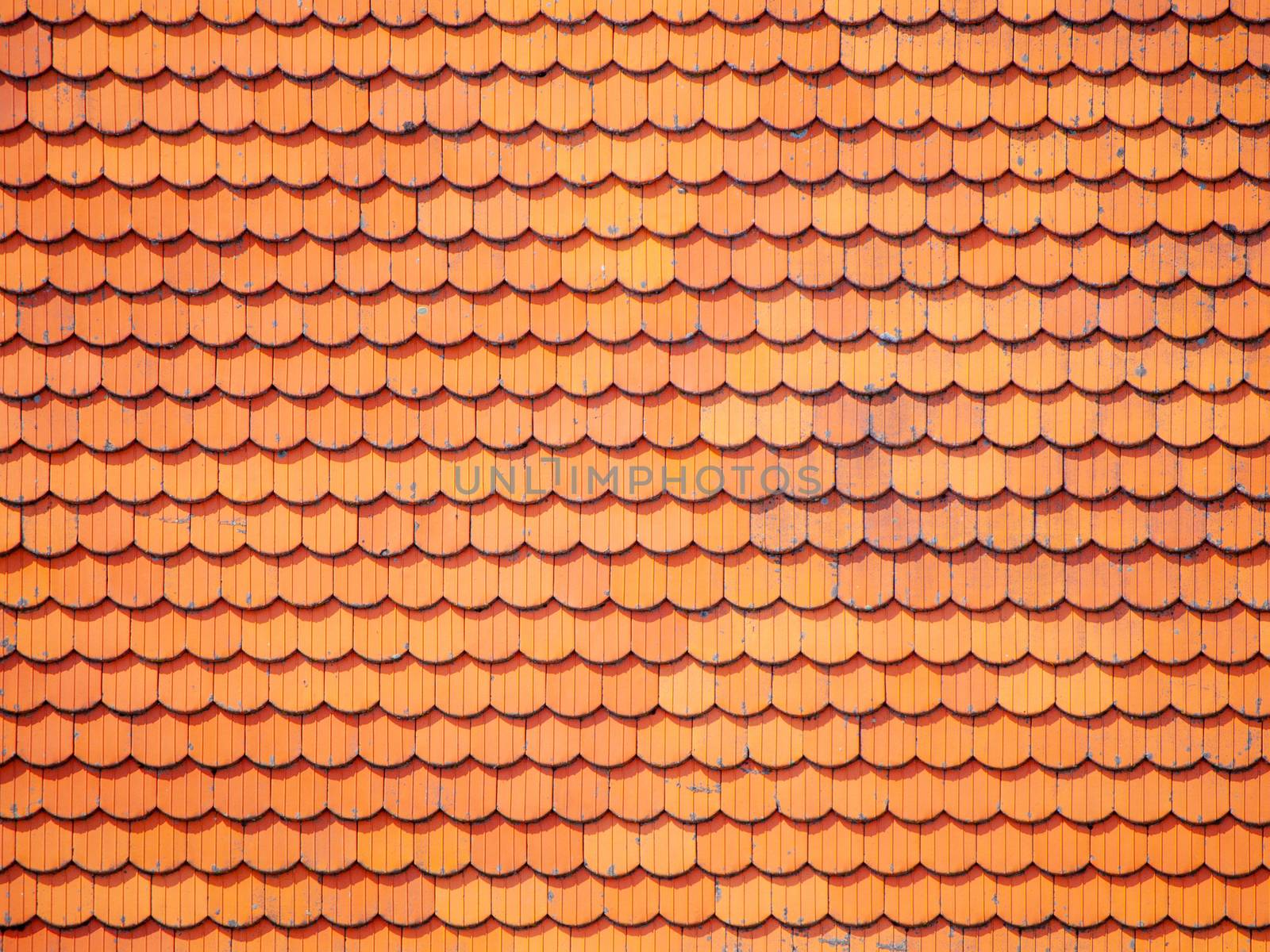 Orange roof of clay tiles. Abstract background texture by pyty