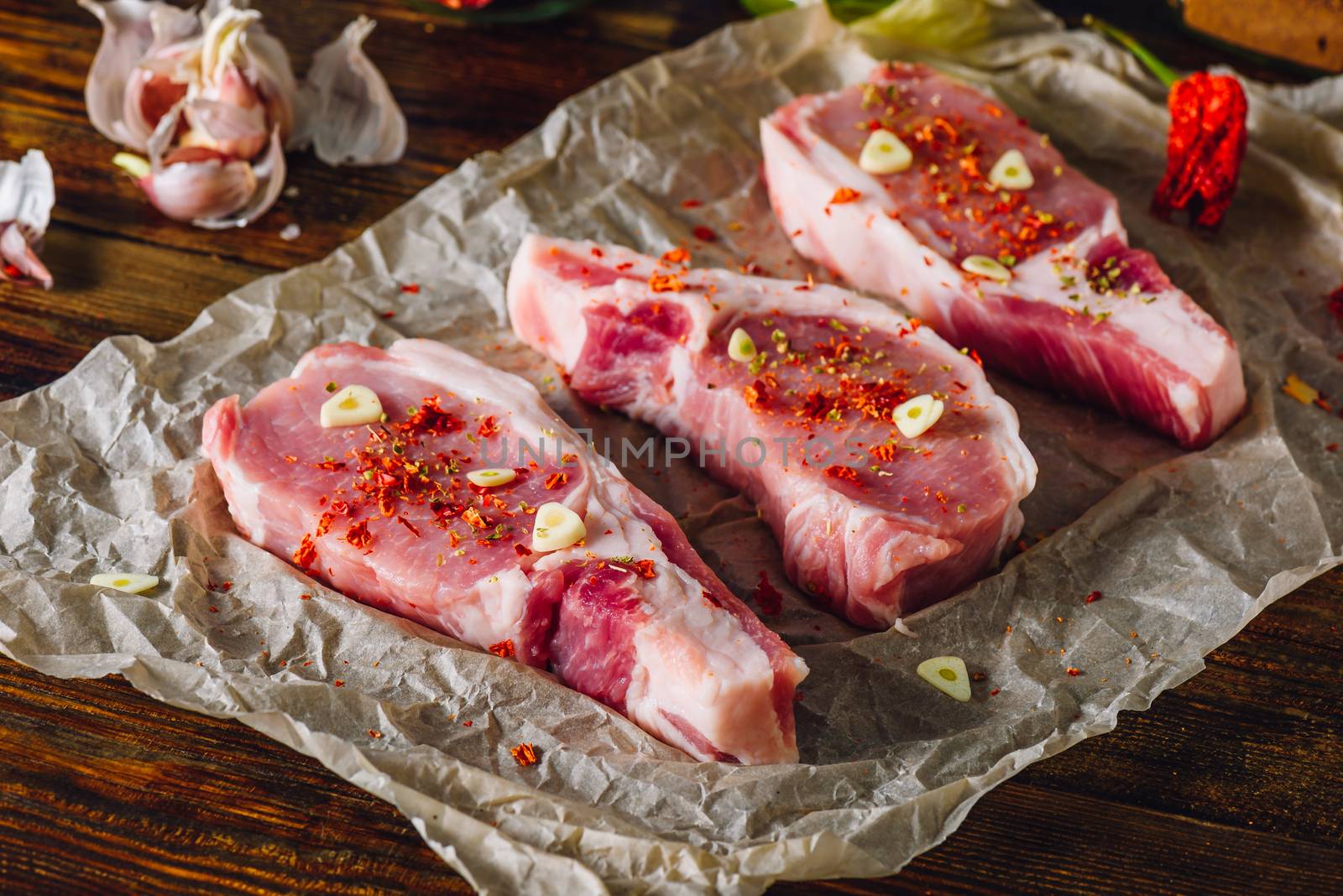 Pork Steaks Prepared for Roasting with Different Spices.