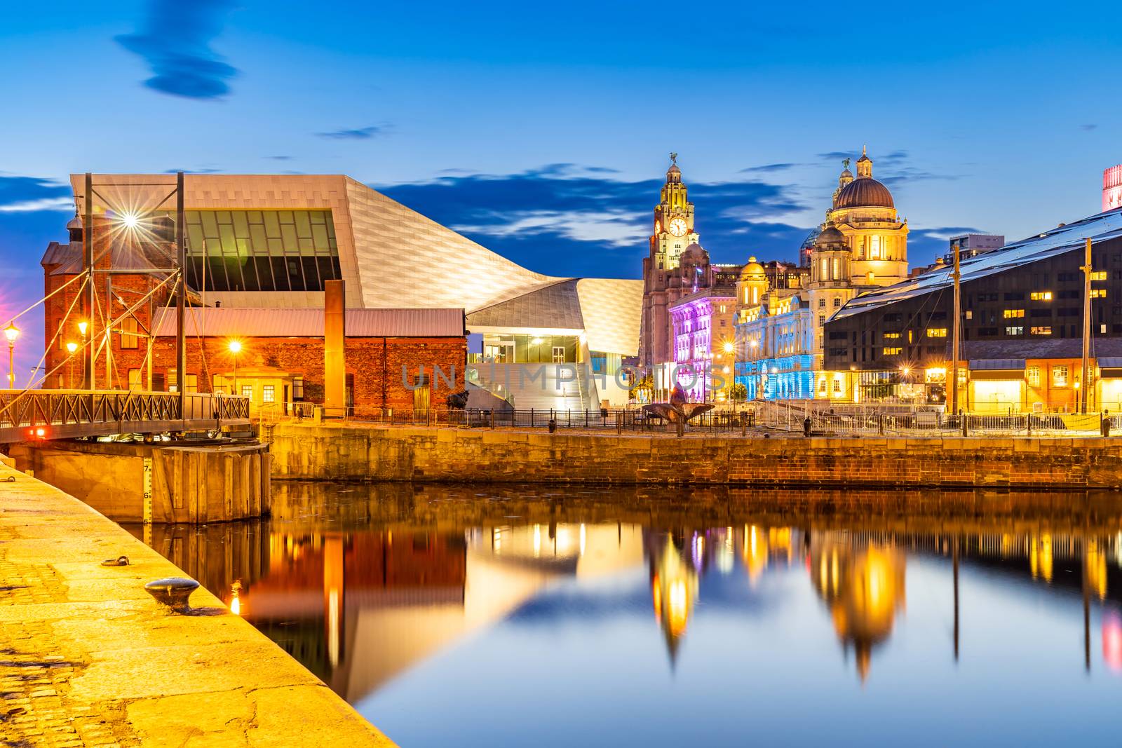 Liverpool Skyline building at Pier head and alber dock at sunset dusk, Liverpool England UK.