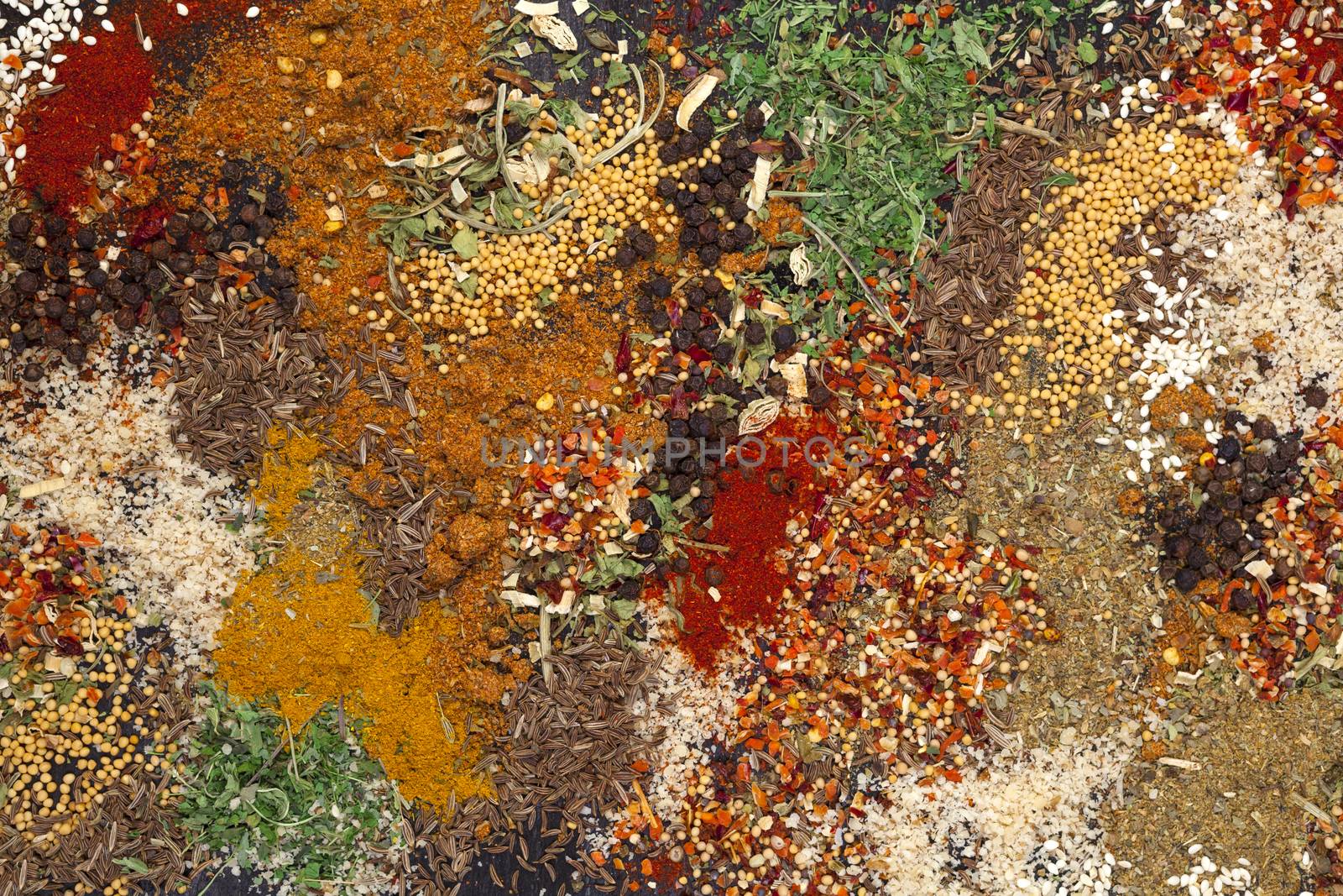 Different herbs and spices texture, colorful food background