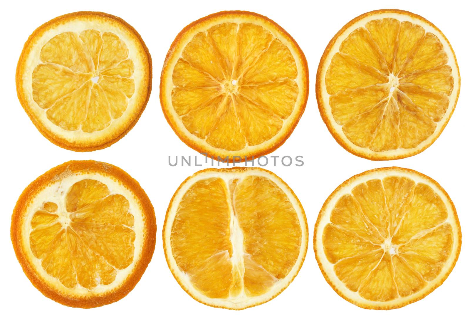 Dried oranges isolated on white background closeup top view
