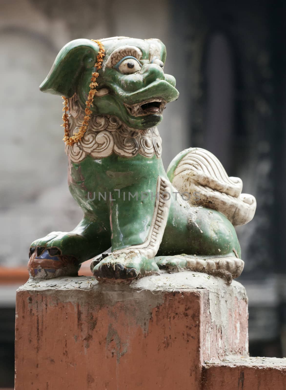 Marble lion at the entrance of a temple, Vietnam