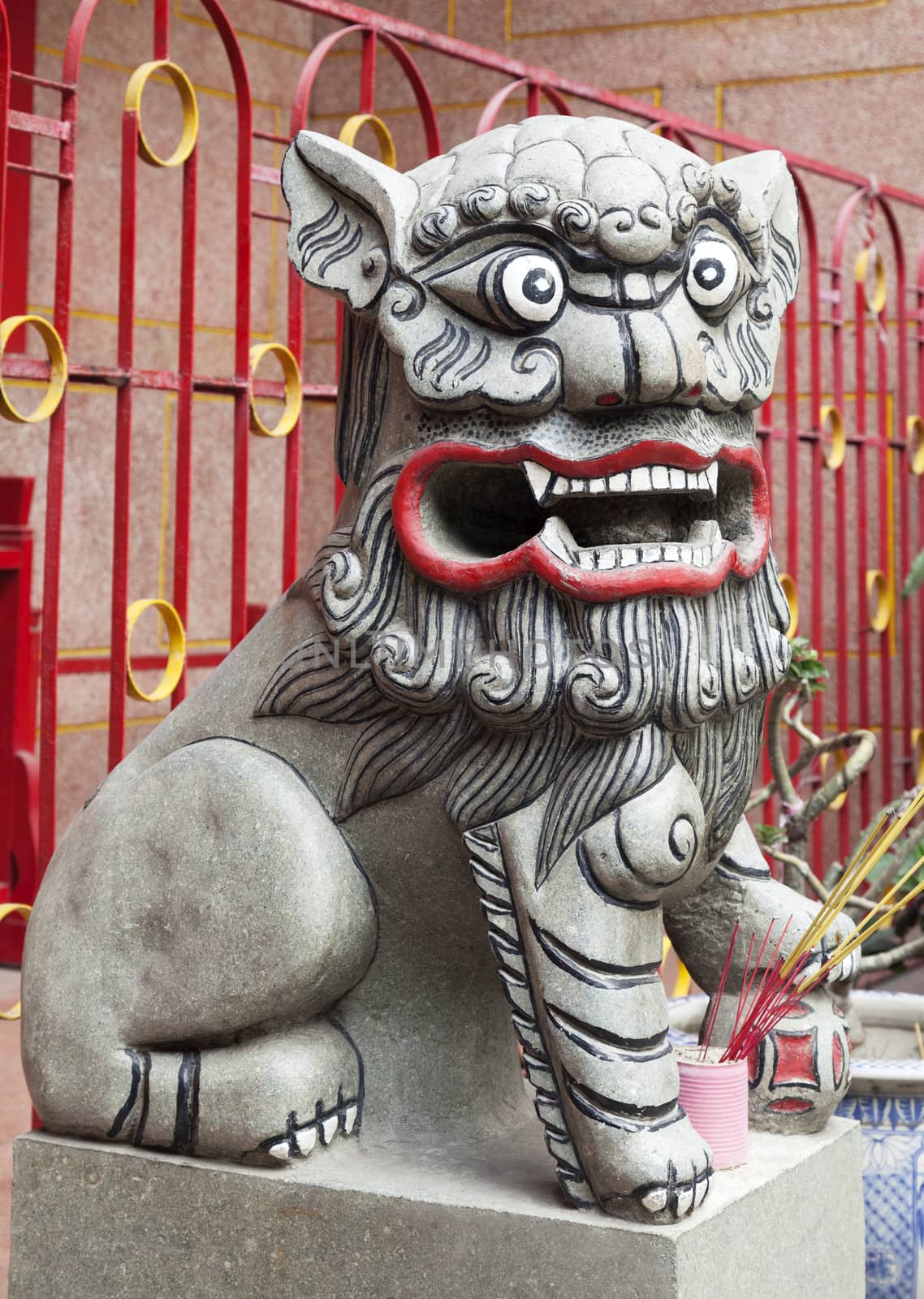 Marble lion at the entrance of a temple, Vietnam