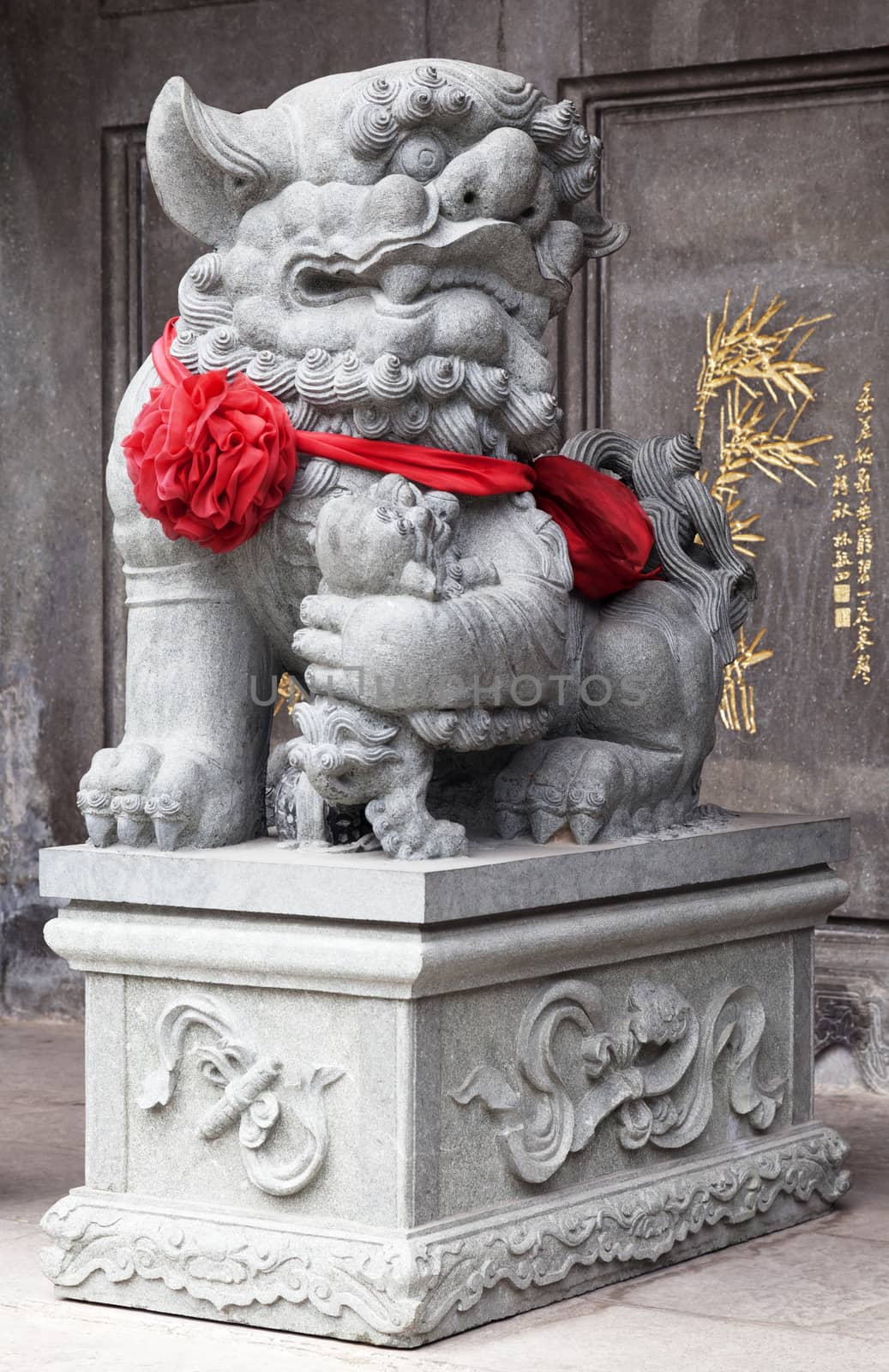 Marble lion at the entrance of a temple, Vietnam