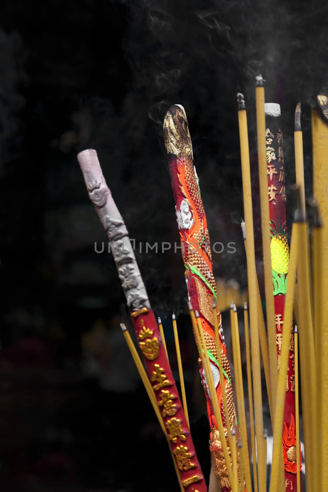 Burning incence sticks in a Buddhist temple