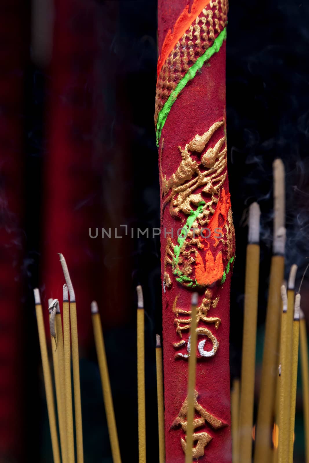 Burning incence sticks in a Buddhist temple