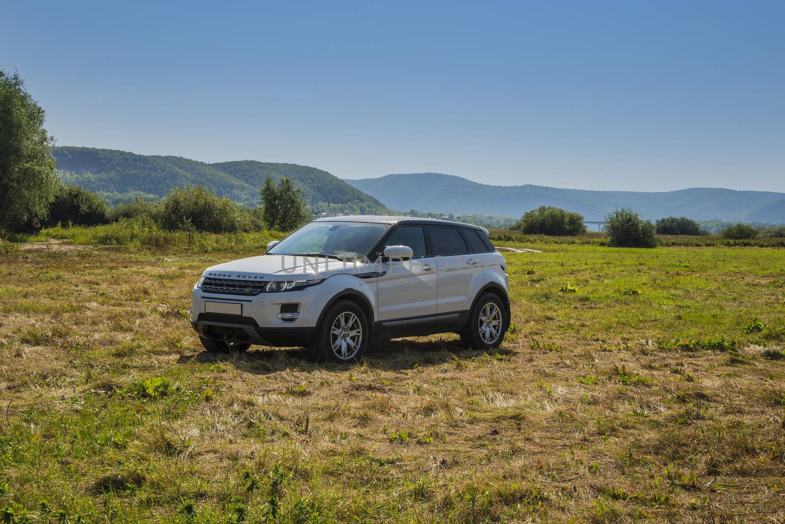 Car Land Rover Range Rover is in the field on a Sunny autumn day near the city of Samara, Russia. August 1, 2018.