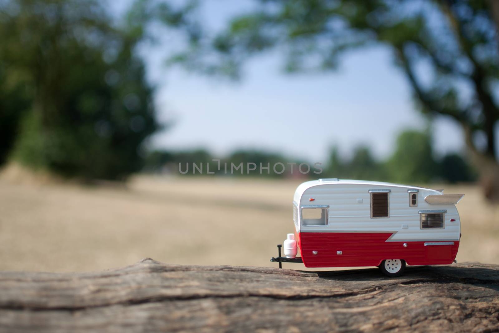 Caravan trailer with countryside background view 