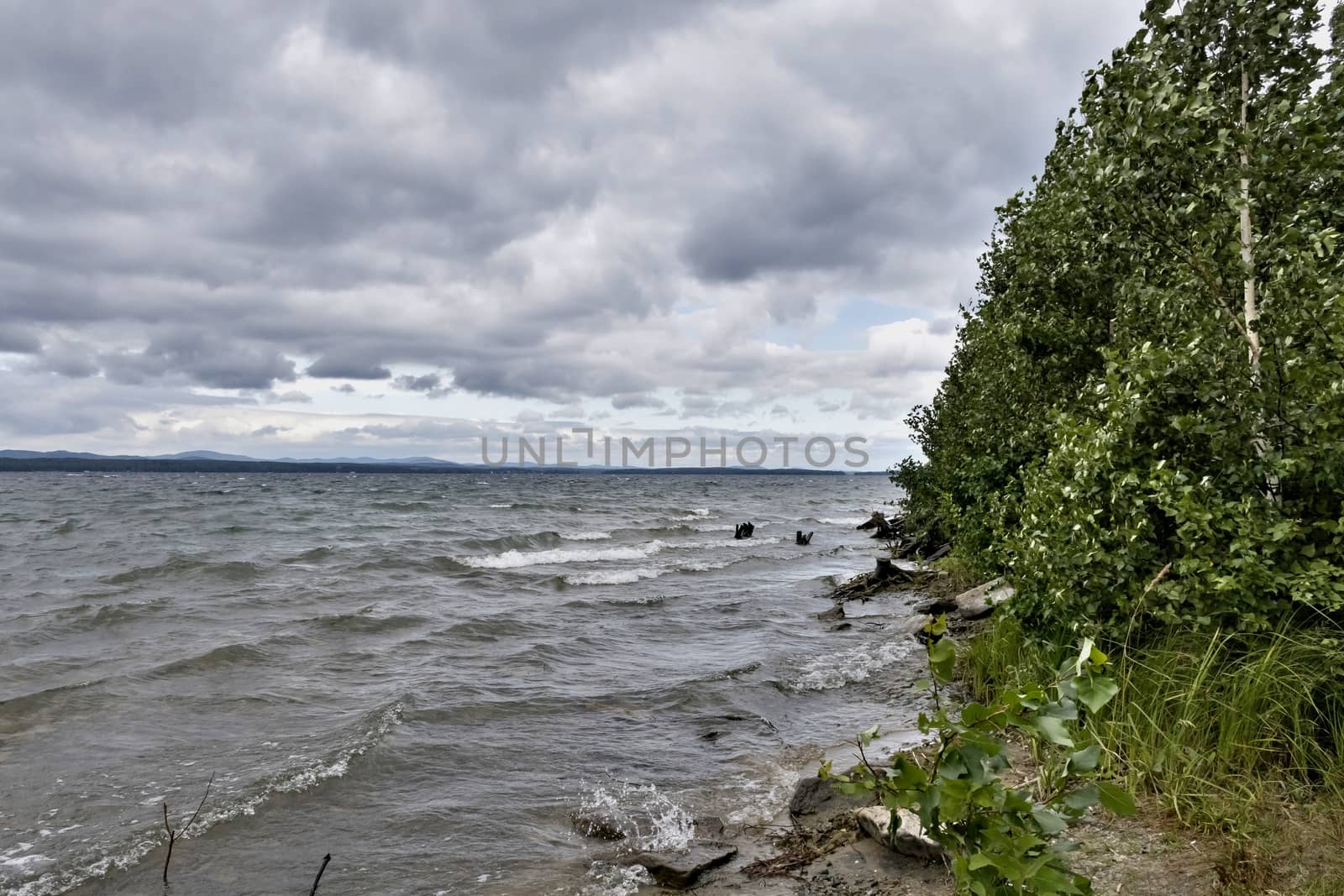 evening lake in cloudy weather, South Ural, Uvildy