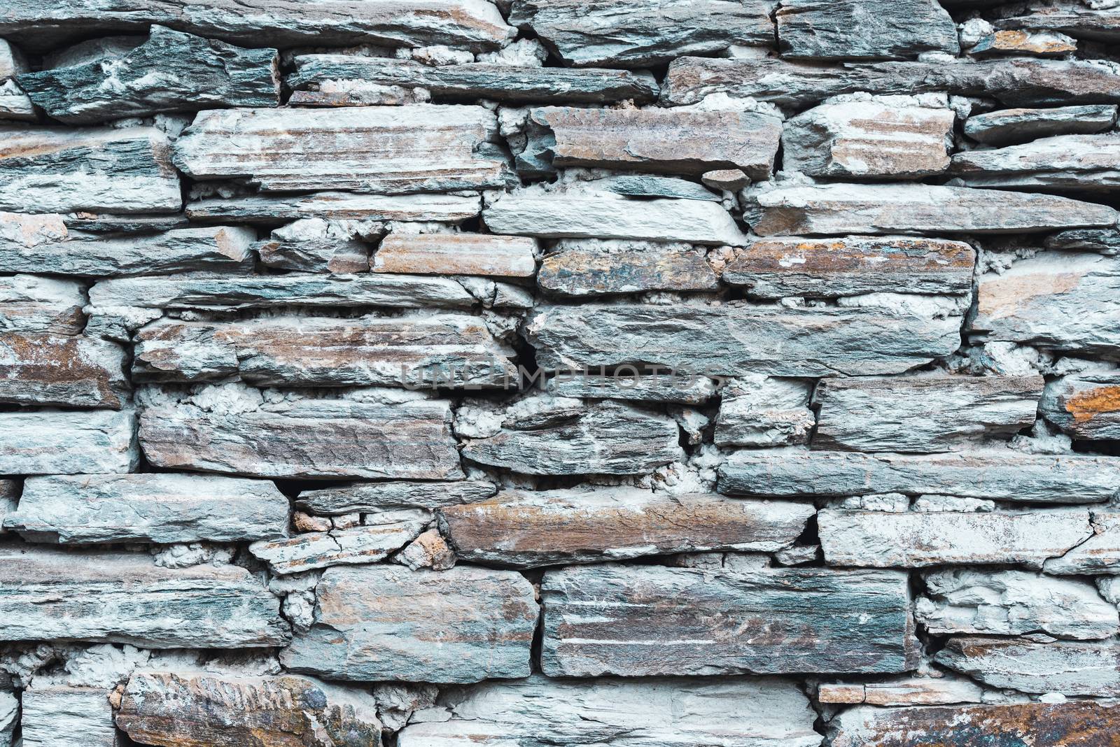 Old grey stone wall texture