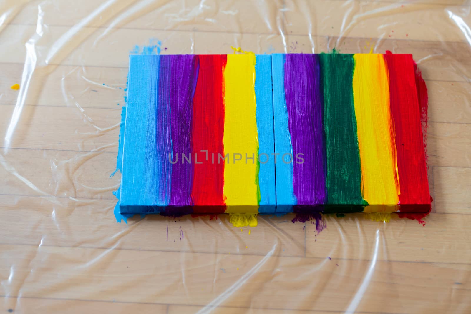 Rainbow on canvas painted with colorful pattern, nobody, close up, acrylic colors, DIY crafts