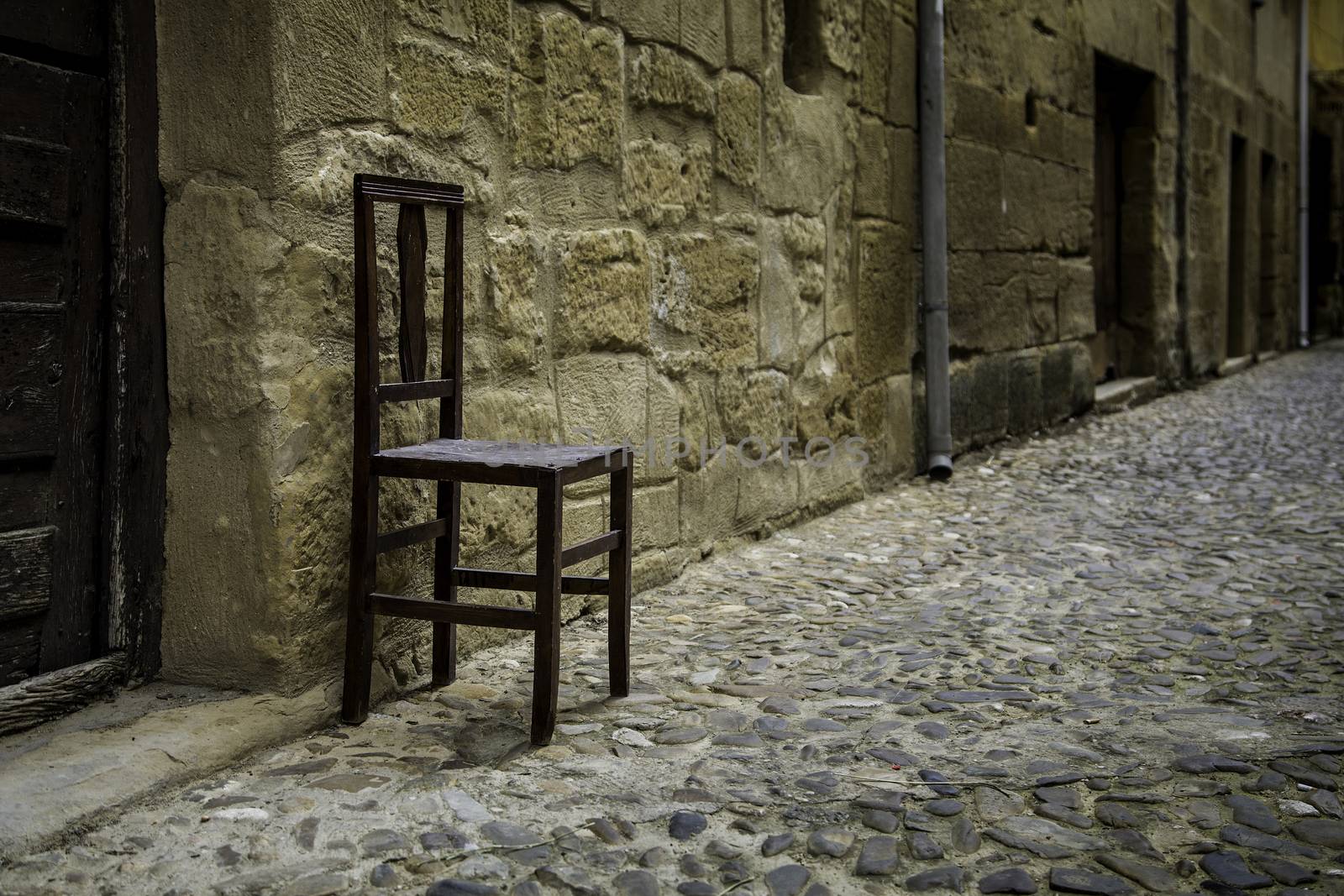 Old wooden chair, detail of relaxation and rest