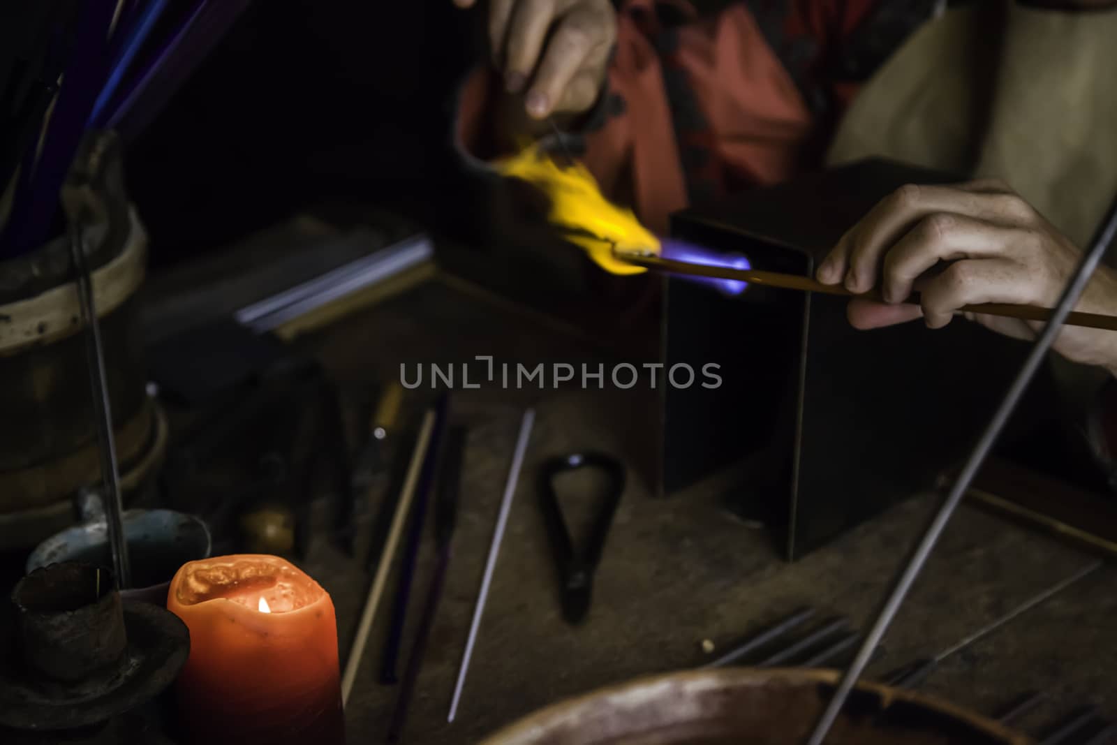 Blowing glass in a traditional way, art detail