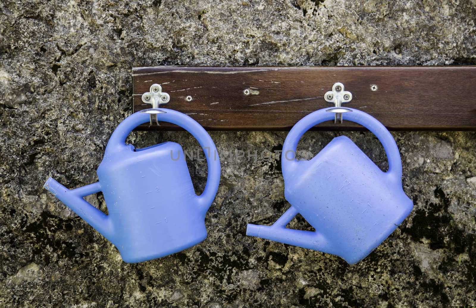 Plastic watering cans, detail of tools for watering