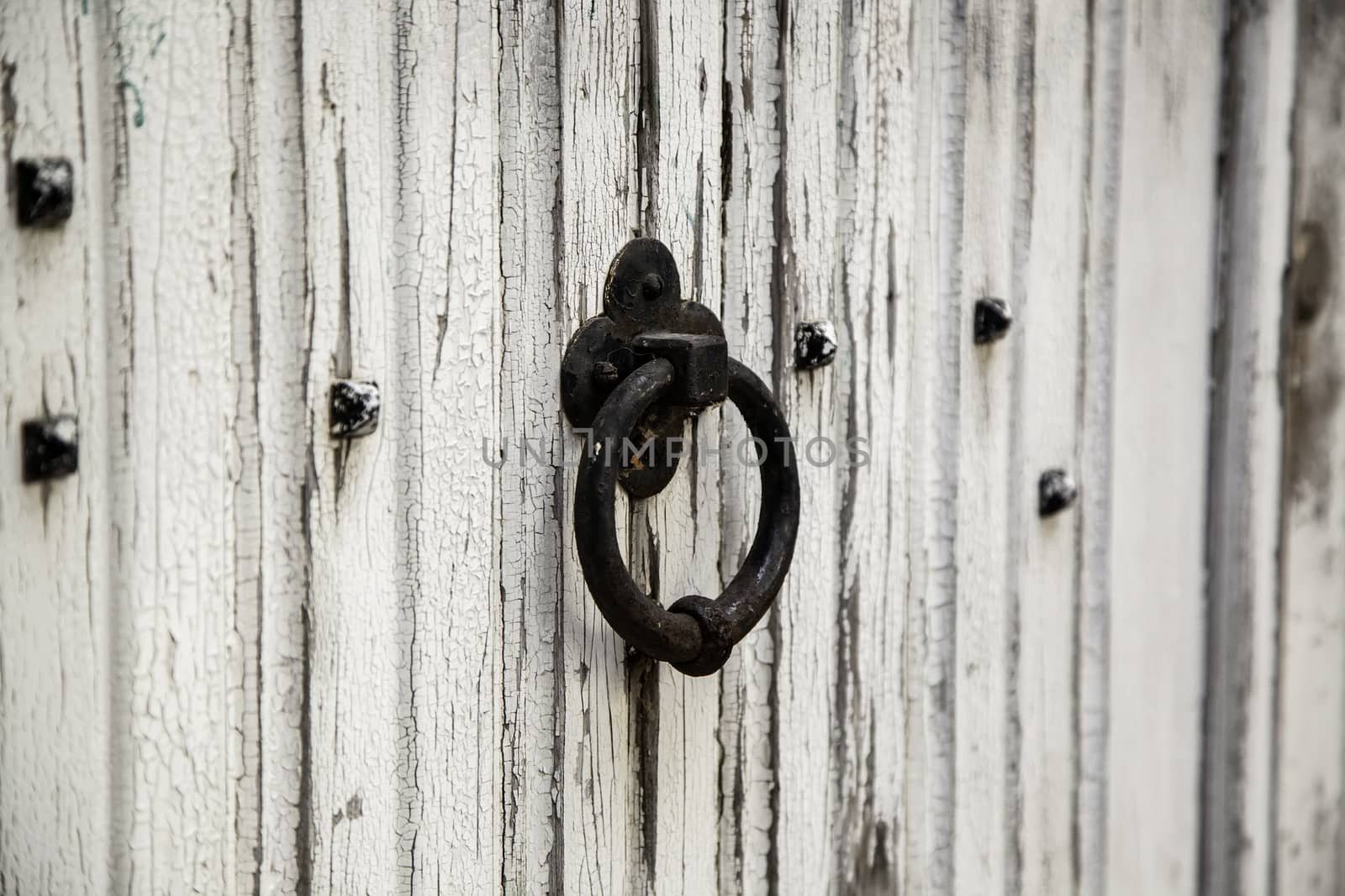 Old metal door knocker, decoration detail
